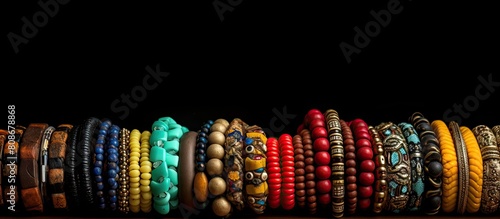 Copy space image featuring variously colored necklaces representing different orishas from the Yoruba religion photo