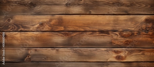 A weathered wooden background that has a natural and rustic appearance providing a copy space image