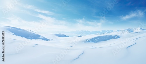 A glistening untouched snow surface with a smooth and pristine texture offering ample copy space image