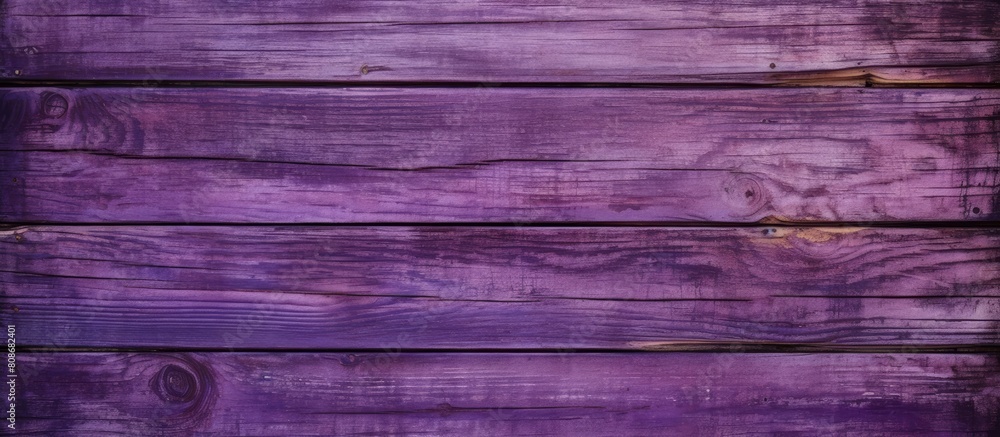A wooden panel background with a textured purple paint design giving it a distressed appearance Suitable for copy space images A wooden panel background with a textured purple paint design giving it a distressed appearance Suitable for copy space images