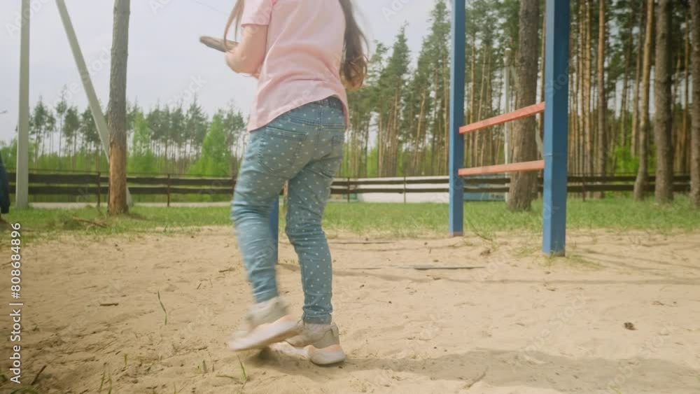 Happy little 4 year old girl walking in nature, in the forest, in the park Happy little 4 year old girl walking in nature, in the forest, in the park
