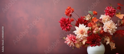 Flower arrangement displayed against a background with copy space image