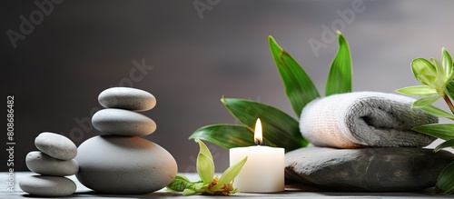 A relaxing spa with aromatic herbs as a soothing background for text in this copy space image
