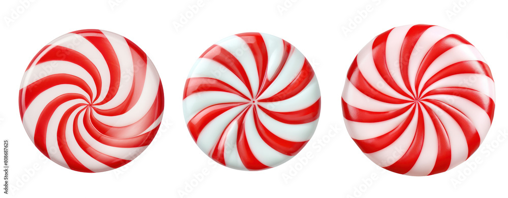 Fototapeta premium Three red and white peppermint candies on a black background.
