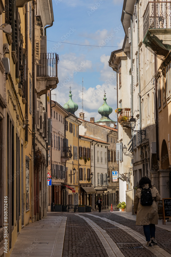 Obraz premium City of Gorizia, Piazza della Vittoria with the Church of Sant'Ignazio and the fountain. The beautiful streets and the castle behind them are a trace of history. Cultural Heritage Capital 2025.