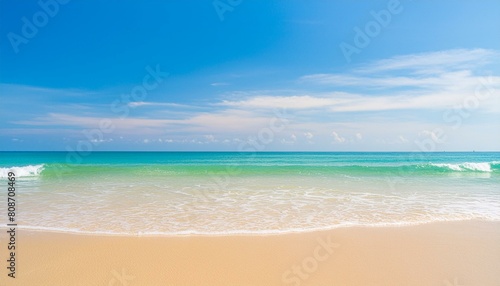 beautiful sandy beach and soft blue ocean wave © ULFATRAZA
