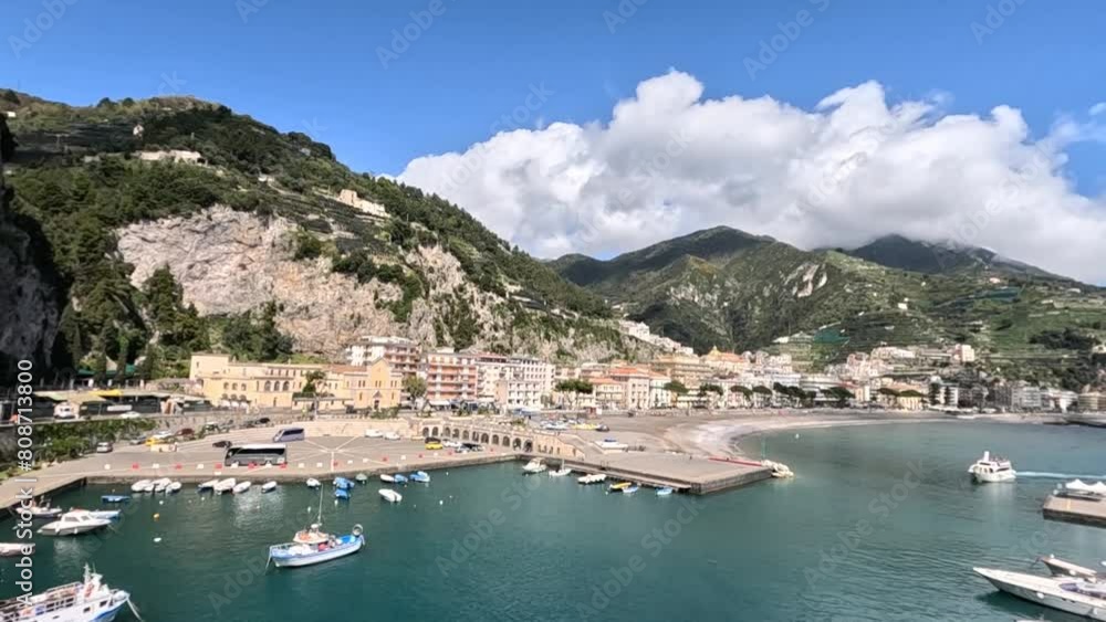 A scenic view of a small town overlooking the sea of Campania, Amalfi, Italy A scenic view of a small town overlooking the sea of Campania, Amalfi, Italy