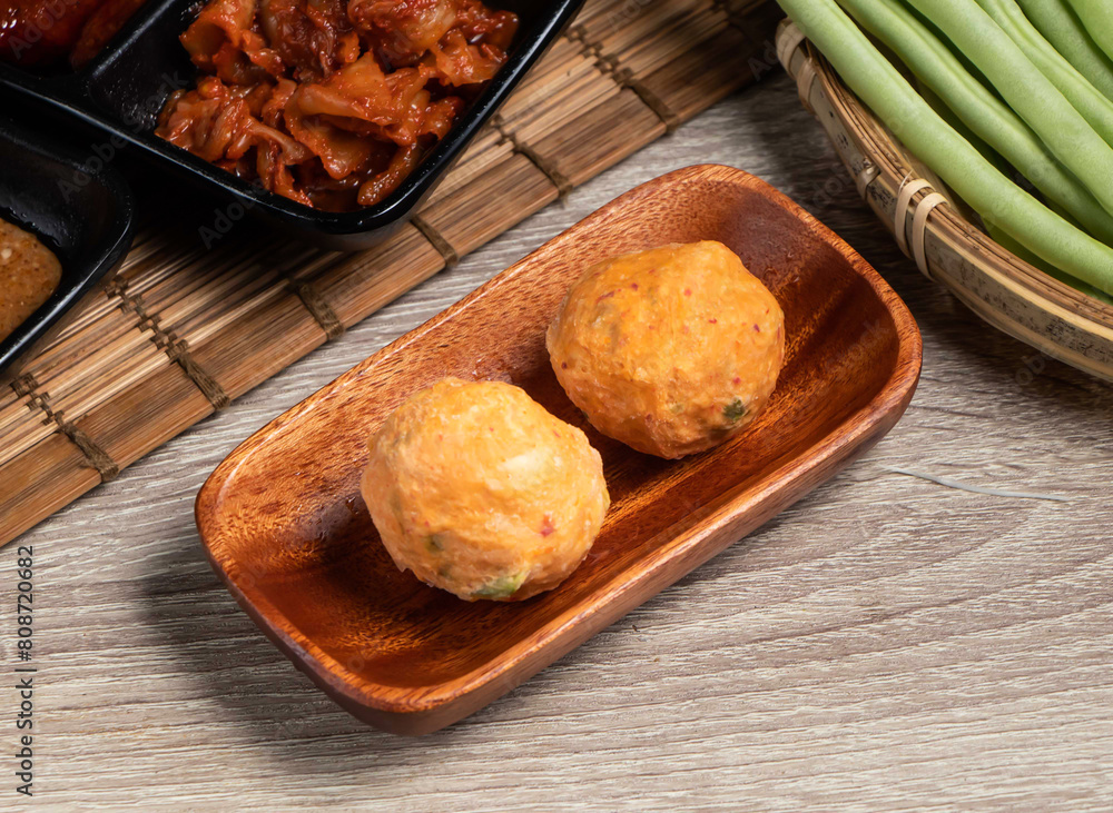 Φωτογραφία Kimchi balls served in dish isolated on wooden board side view of healthy food
