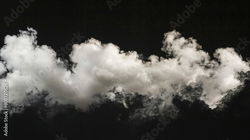 A cloud of white smoke is floating in the air