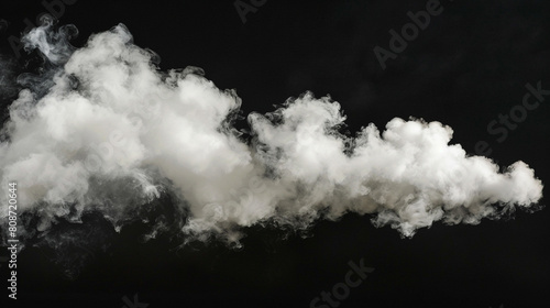 A cloud of smoke is billowing out of a pipe