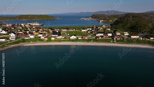 Aerial view away from the Pykeija village, midnight sun in Finmark, Norway photo