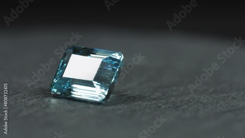 Polished blue gemstone rotates and sparkles