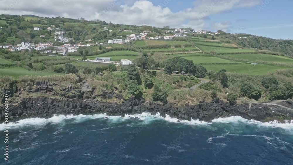 Santo Antonio landscape along coast, Sao Miguel of Azores islands. Aerial forward Santo Antonio landscape along coast, Sao Miguel of Azores islands. Aerial forward