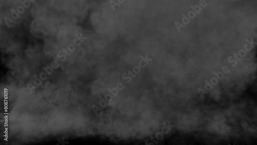 a powerful explosion with a lot of smoke on a black background photo