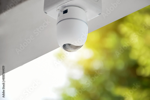 ip cctv camera installed on high ceiling of the house to do the security by monitoring through mobile phone and computer to save human life and property, soft and selecitve focus.