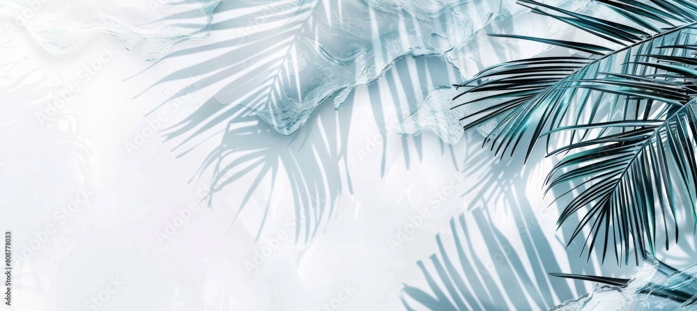 Tropical tranquility: palm leaves on a white fuzzy background