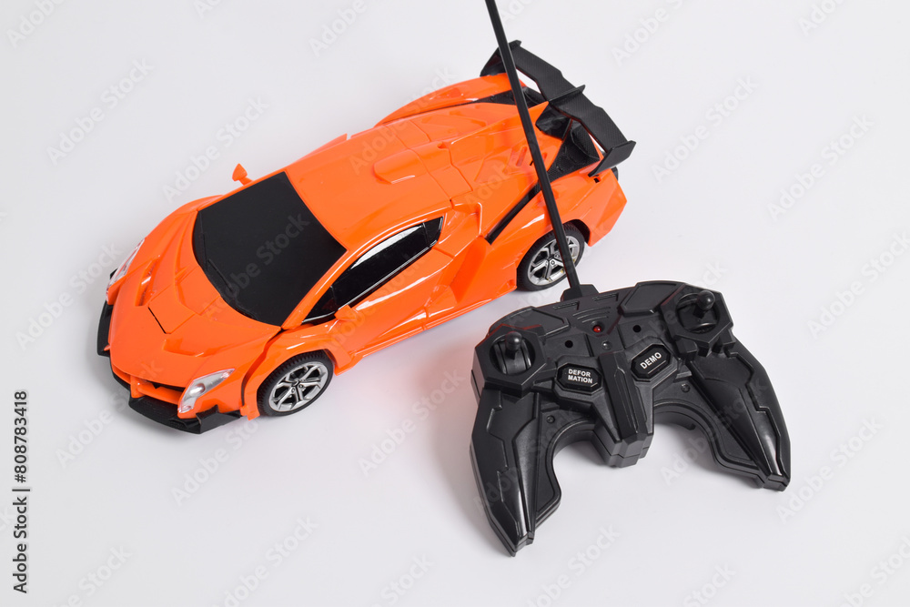 Remote controlled toy car with a game controller. RC cars can turn into robots Remote controlled toy car with a game controller. RC cars can turn into robots