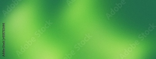 Dark green blue glowing grainy gradient background.