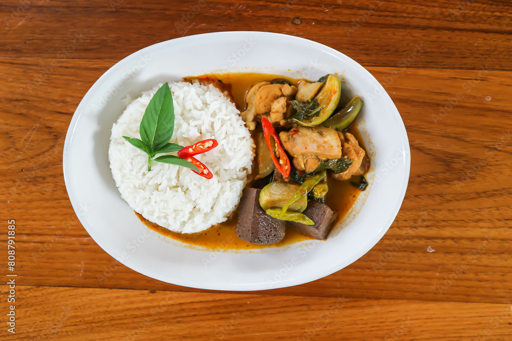 chicken curry , yellow curry chicken or chicken soup with rice chicken curry , yellow curry chicken or chicken soup with rice