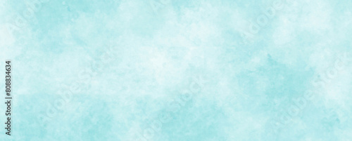 Soft Blue Watercolor Texture with Cloudy Gradient Pattern on White Paper Background
