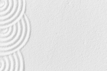 Zen like concept,Whit Sand texture with simple spiritual patterns,Japanese Zen Garden with concentric circles and parallel lines on sandy surface background,Harmony,Meditation