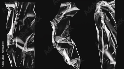 isolated transparent adhesive tape or strips. set of crumpled plastic sticky snips on black background. clear masking tape