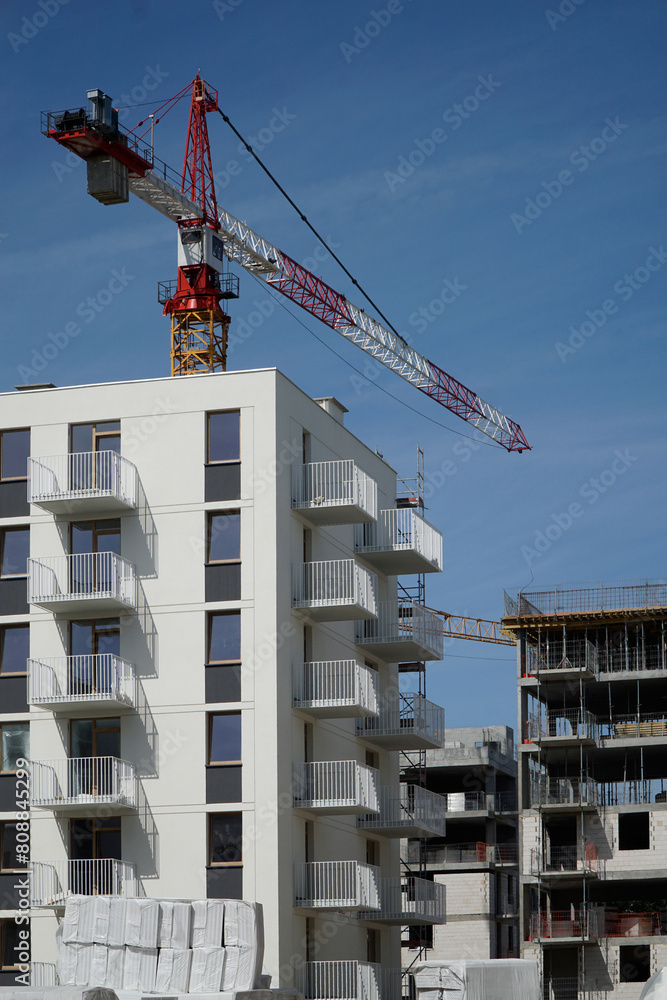 Modern multistorey building and construction crane
