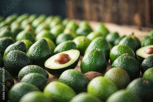 A farmer's market shelf full of fresh avocados. Hass avocado.