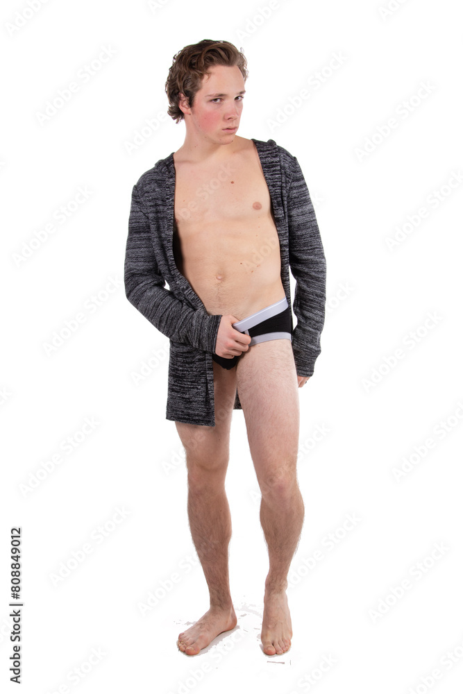 Fototapeta premium Young attractive sporty guy posing on a white background.