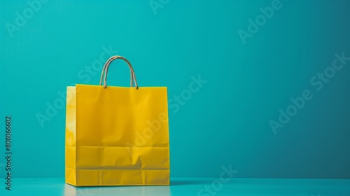 A yellow shopping bag is on a blue background