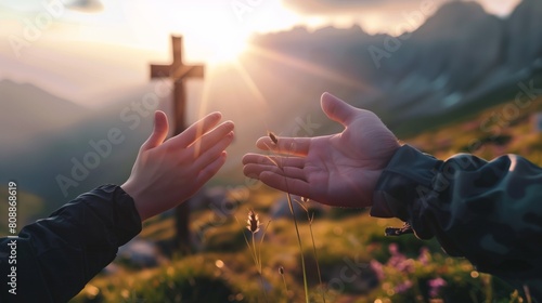 Hands Raised in Prayer Against a Majestic Mountain Sunrise
