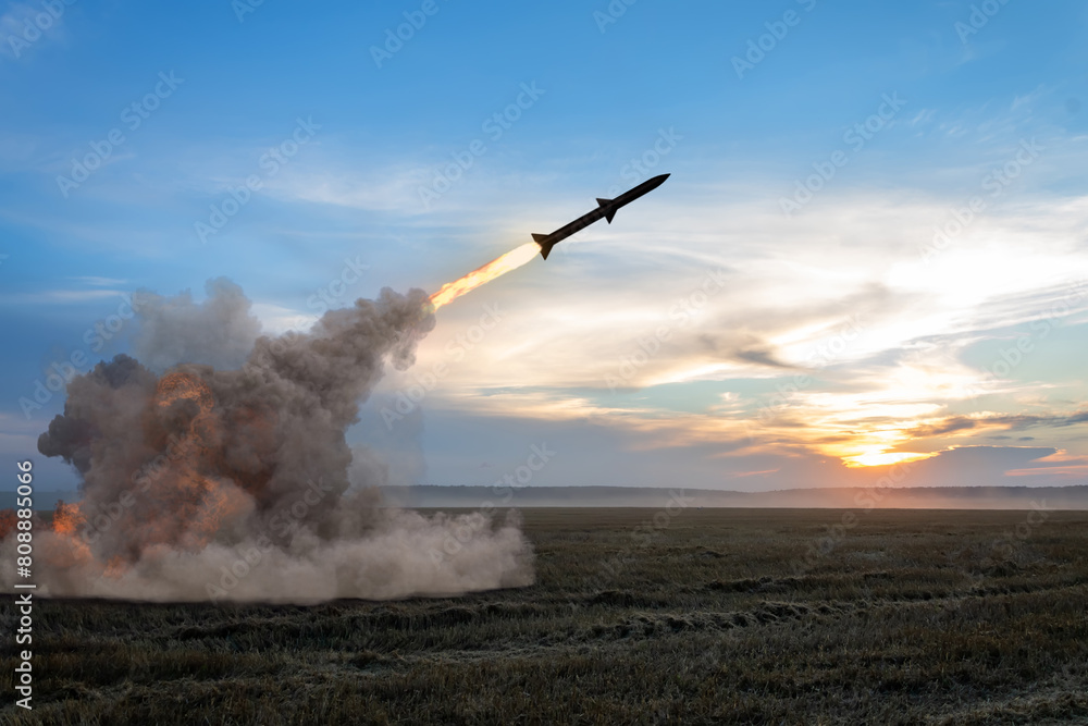 Фотография Launching a rocket from a rocket launcher in the fields