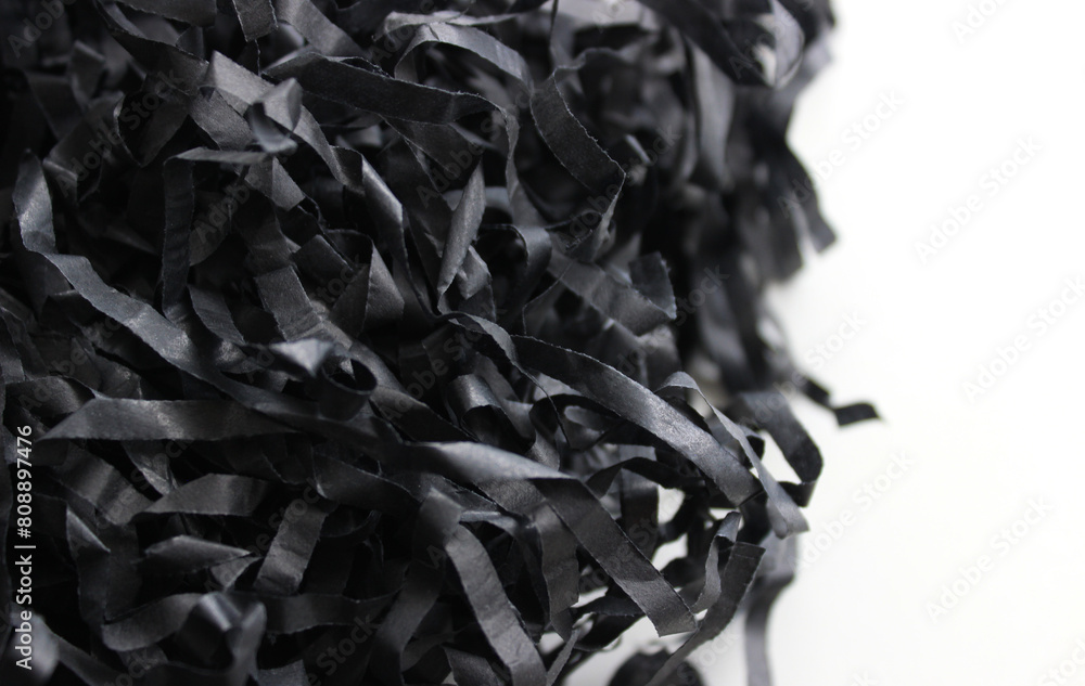 Intertwined strips of crumpled black wrapping paper isolated on white. Paper shavings for decoration stock photo
Intertwined strips of crumpled black wrapping paper isolated on white. Paper shavings for decoration stock photo