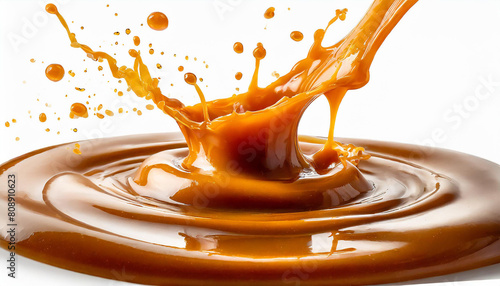 caramel liquid sauce splashes, drops isolated on white background with clipping path.
