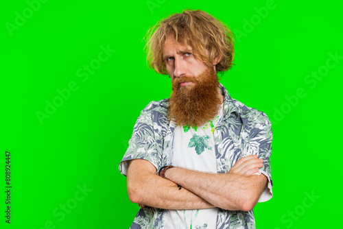 Offended sad nervous bearded man having misunderstanding, frustrated after quarrel, fail, lose, ignores and does not want to communicate, talk. Guy isolated on chroma key background. People lifestyles