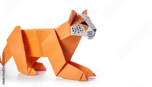 Animal concept origami isolated on white background of a cheetah - Acinonyx jubatus - with copy space side view with spot, simple starter craft for kids photo