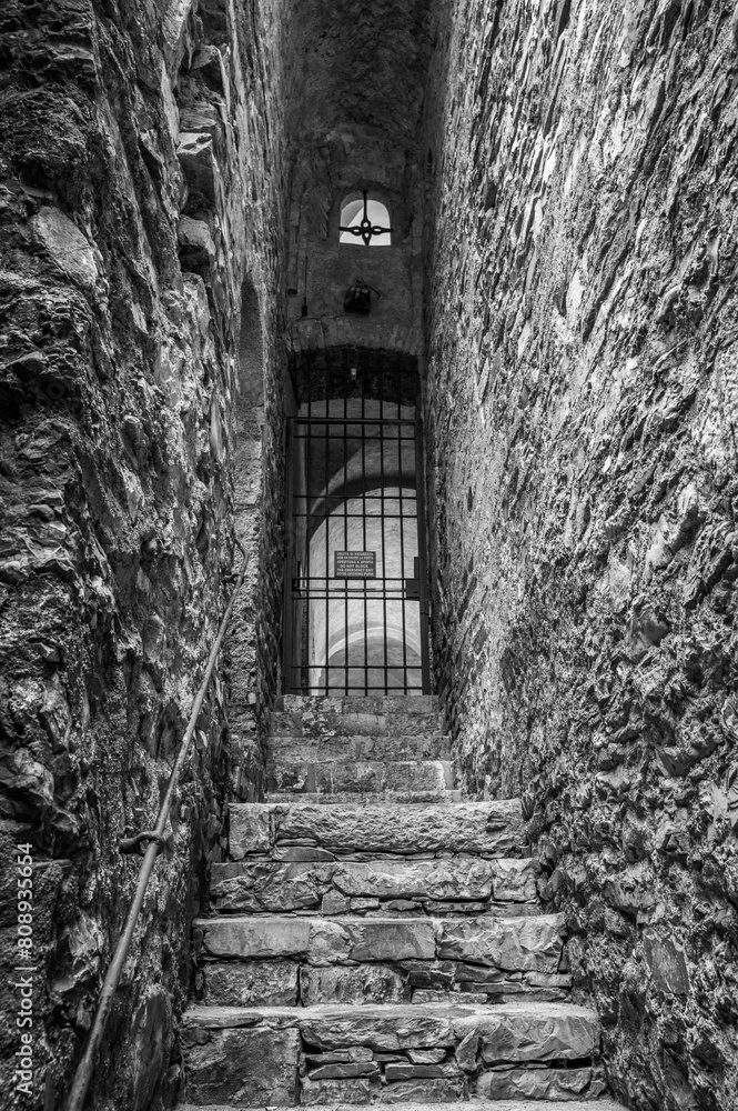 Magic of Liguria. Timeless images. Ancient abbey of San Fruttuoso, bay and historic building guarded by the FAI. Italian Environmental Fund. Black and white. Magic of Liguria. Timeless images. Ancient abbey of San Fruttuoso, bay and historic building guarded by the FAI. Italian Environmental Fund. Black and white.