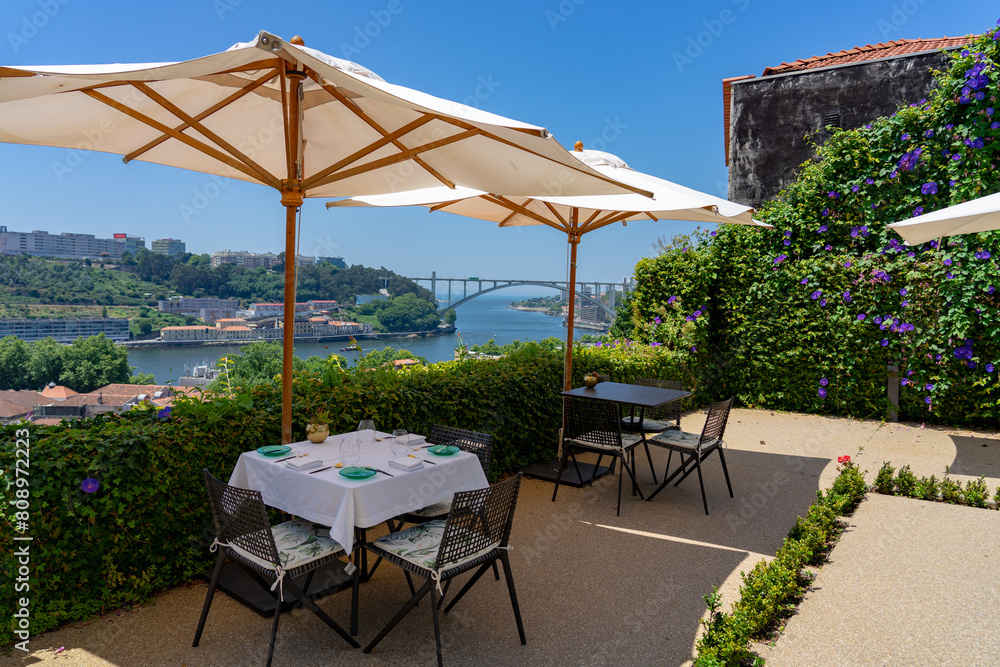 restaurant with tables to enjoying the view over Porto Portugal from the Jardins do Palacio de Cristal Crystal Palace gardens