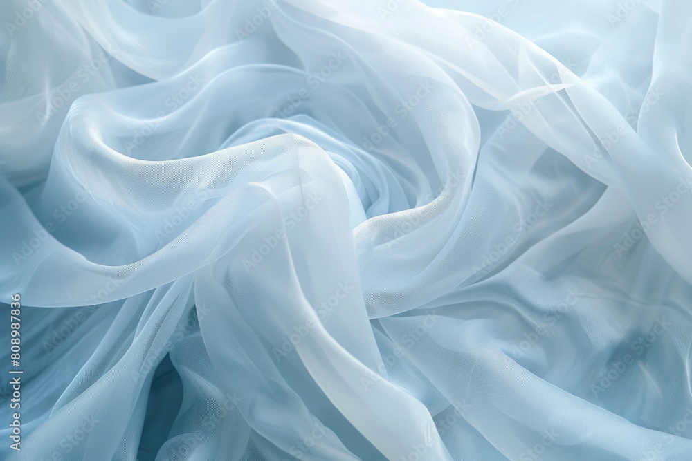 Fototapeta premium Elegant Light Blue Silk Fabric Flowing in Soft Folds and Waves