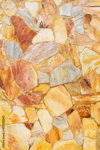Colorful stone wall. Vertical image. Advertising space. Vertical.