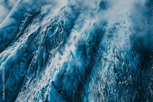 textured surface of massive vatnajökull glacier in iceland on winter day aerial drone photography