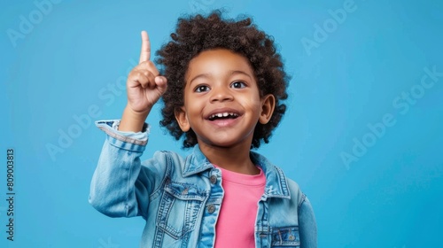 A Cheerful Boy Sharing an Idea photo