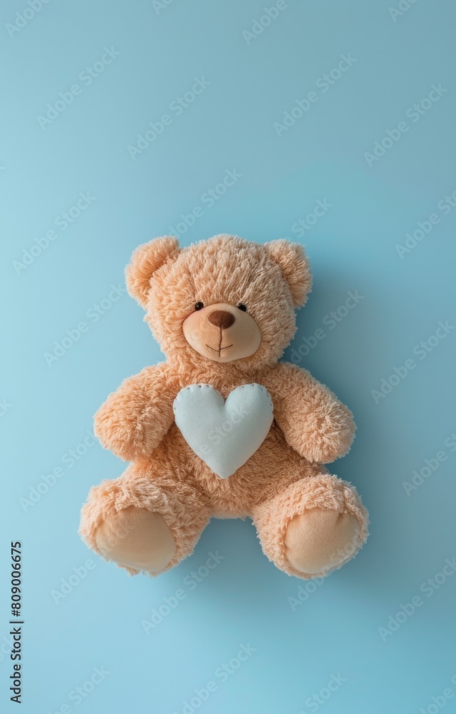 Teddy bear centered against a pastel blue background Teddy bear centered against a pastel blue background