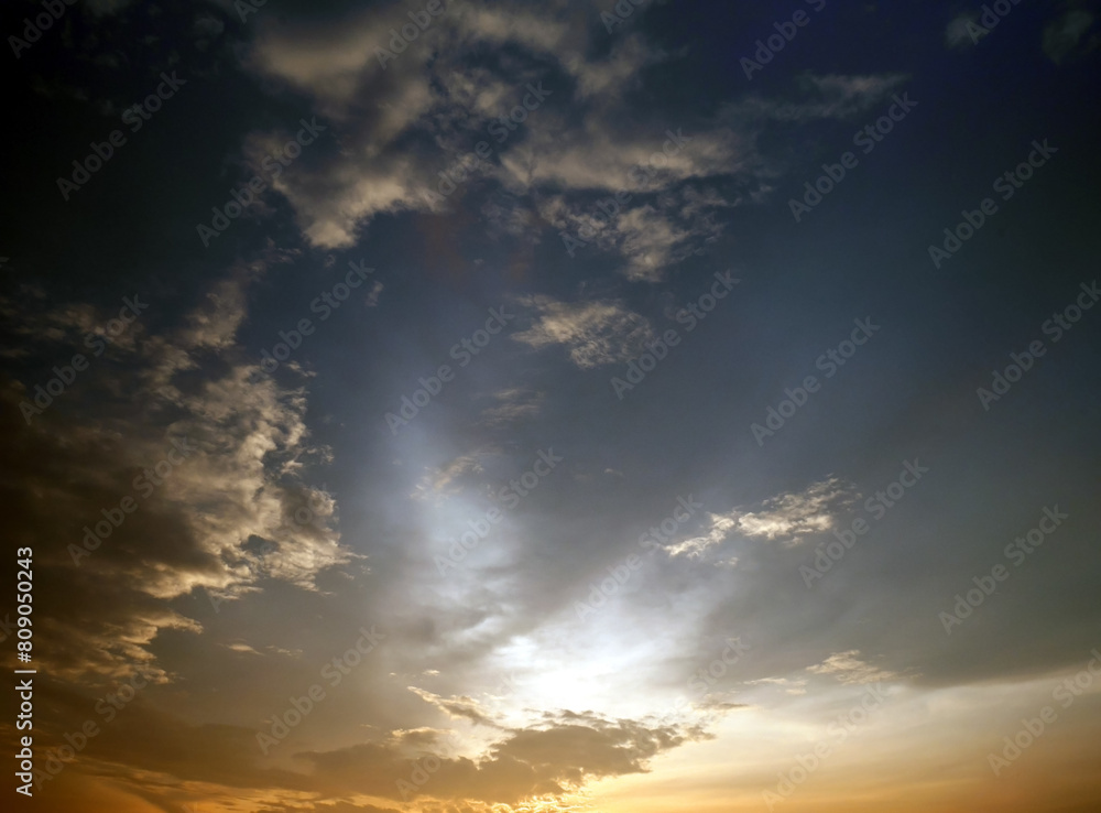 Fototapeta premium Bright orange and yellow colors sunset sky 