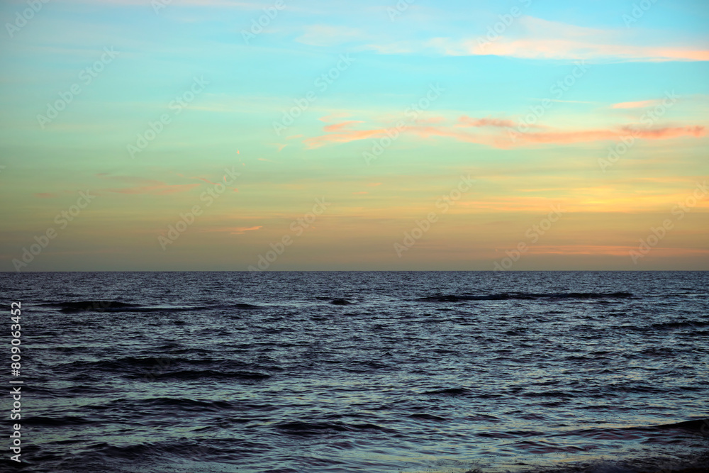 Dramatic red ocean waves at sunset with soft evening sea dark water Dramatic red ocean waves at sunset with soft evening sea dark water