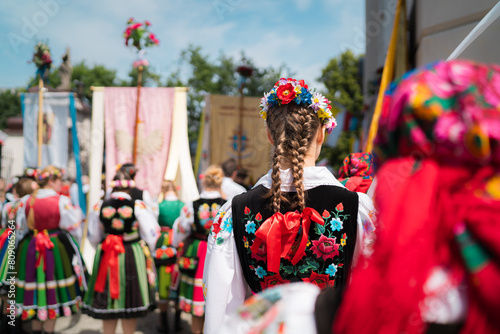 People in traditional Polish folk costumes at Łowicz Corpus Christi procession