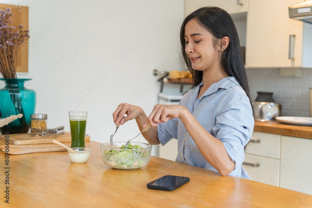 Asian woman dieting Weight loss eating fresh fresh homemade salad healthy eating concept Asian woman dieting Weight loss eating fresh fresh homemade salad healthy eating concept
