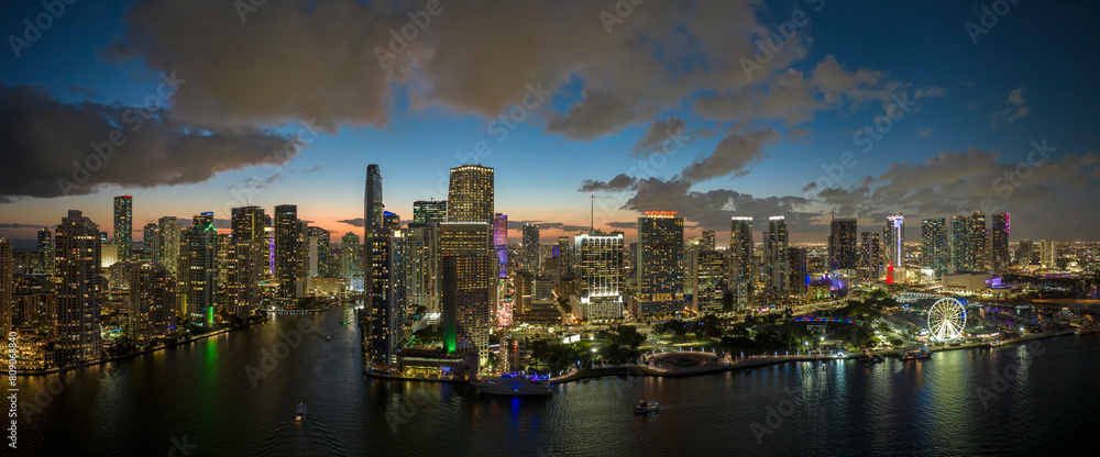 Naklejka premium Night urban landscape of downtown district of Miami Brickell in Florida, USA. Skyline with brightly illuminated high skyscraper buildings in modern american megapolis
