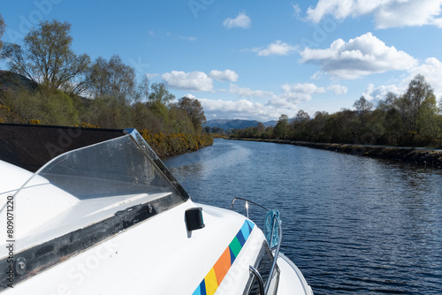 Boat view on the Caledonian Canal in the Scottish highlands. photo