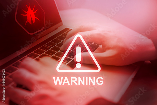 Computer warning: Alert! Malware detected in the system. Cybersecurity concept